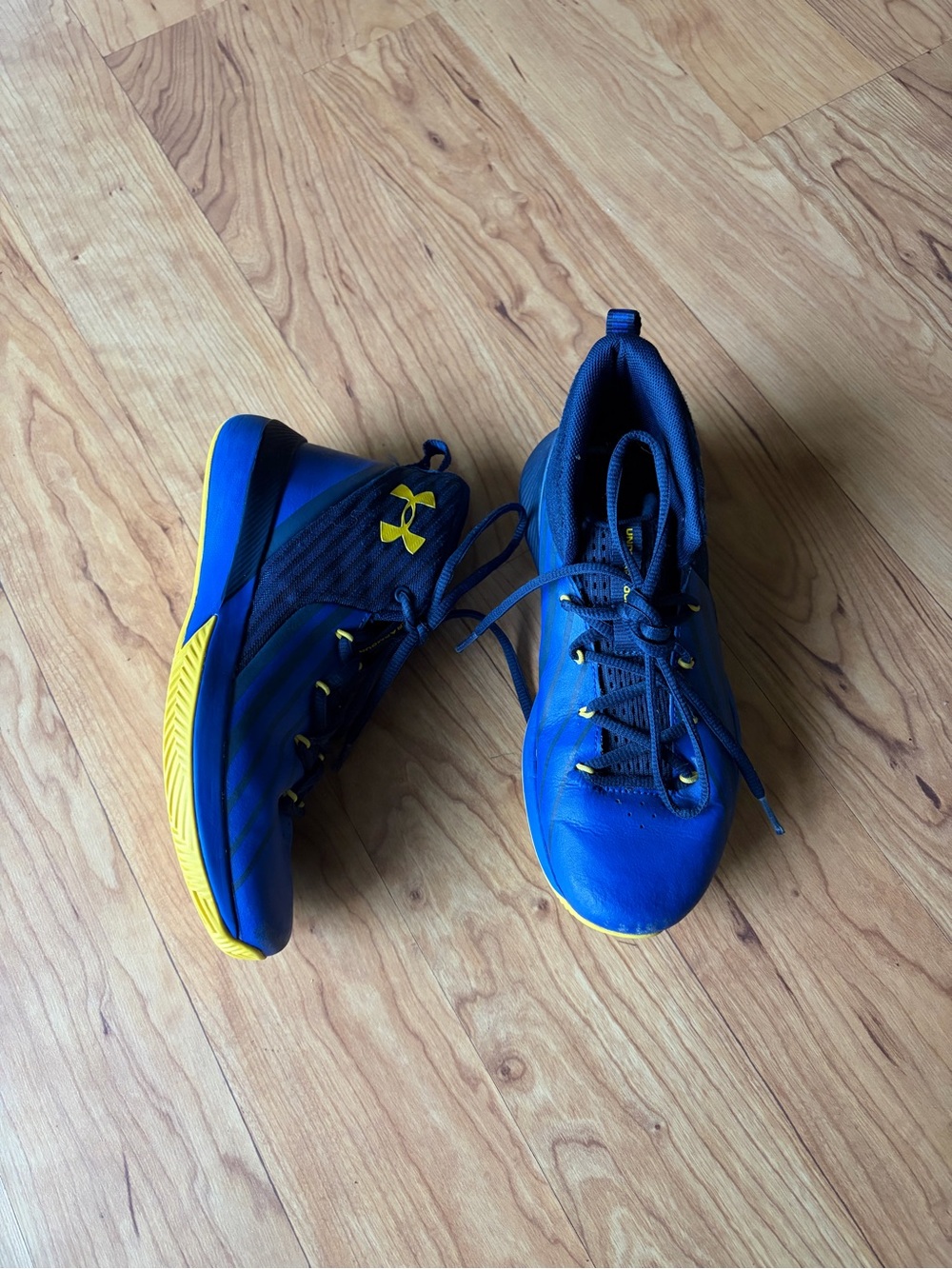 Under Armour Boys Blue Athletic Shoes with Yellow Sole Accents